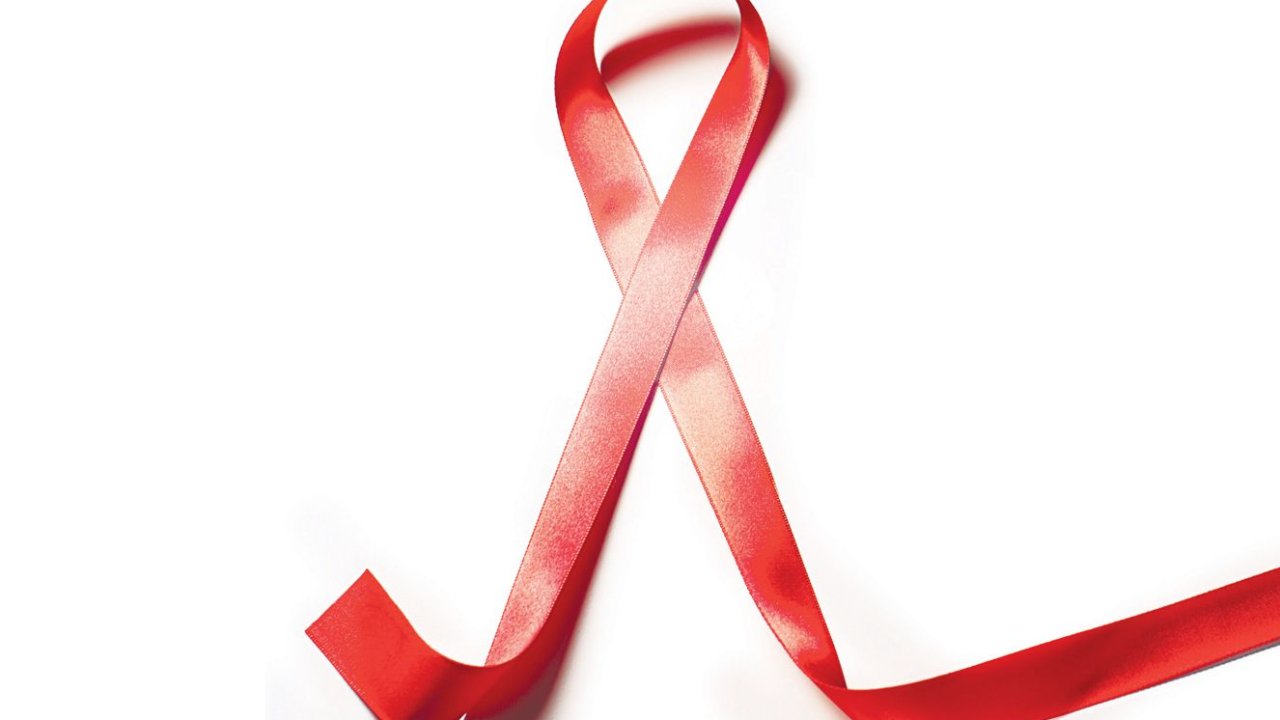 Fita vermelha que simboliza luta contra a aids.
