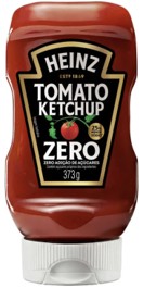 Frasco vermelho de ketchup Heinz Tomato Ketchup Zero, com rótulo preto e dourado, um tomate vermelho e a informação Zero adição de açúcares e 373g em branco. A tampa é branca e está na parte inferior do frasco